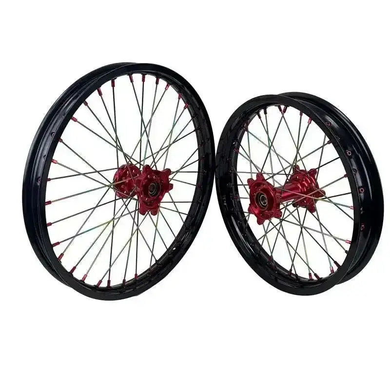 20-inch black and red Sur Ron Ultra Bee alloy wheels with silver spokes