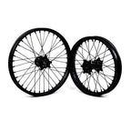 Black Sur Ron Ultra Bee 19/16 inch aluminum wheel set with rainbow spokes and disc brake