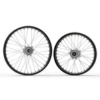 20-inch black silver Sur Ron Ultra Bee wheels with rainbow spokes