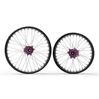 20-inch purple silver Sur Ron Ultra Bee alloy wheels with white spokes