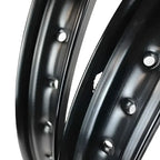 Black 19-inch Sur Ron Ultra Bee aluminum wheel rim with silver bolts and rainbow spokes