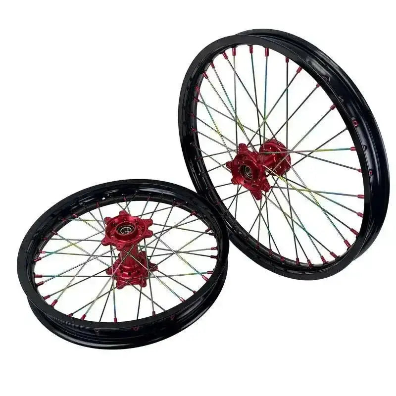 20-inch black and red Sur Ron Ultra Bee alloy wheels with rainbow spokes