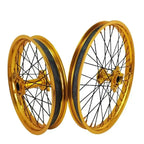 21-inch and 18-inch blue Sur Ron Ultra Bee aluminum alloy wheel set with gold wire-spoke rims