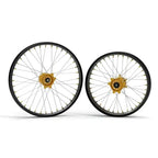 Gold and black 21 18 inch Sur Ron Ultra Bee aluminum alloy wheel set with silver spokes
