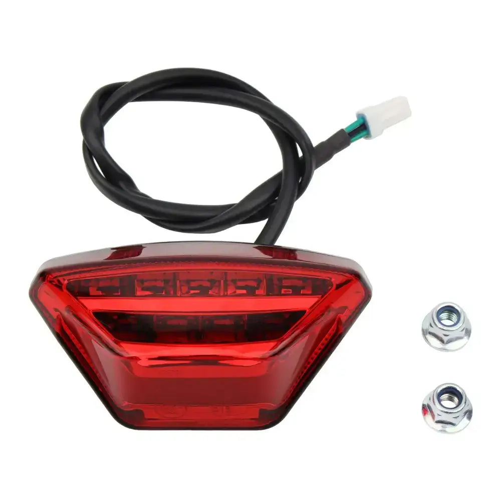 Red KTM-style taillight with clear lens, chrome hardware for Sur-Ron Ultra Bee