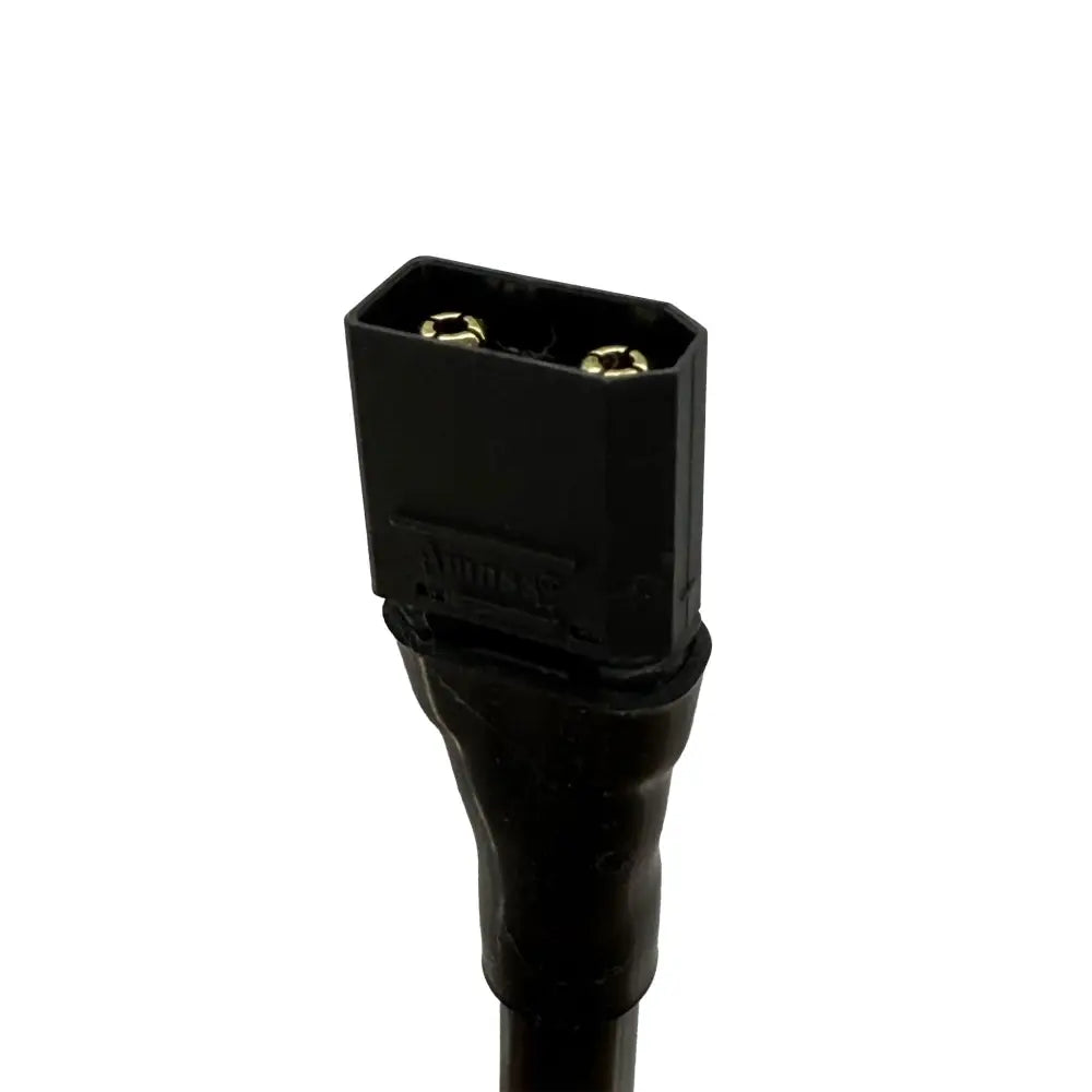 Black plastic Nexbat 81V Sur-Ron charger power cord with gold screws and Apico branding