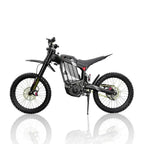 HEZZO 8000W electric dirt bike in matte black with red accents, carbon fiber frame